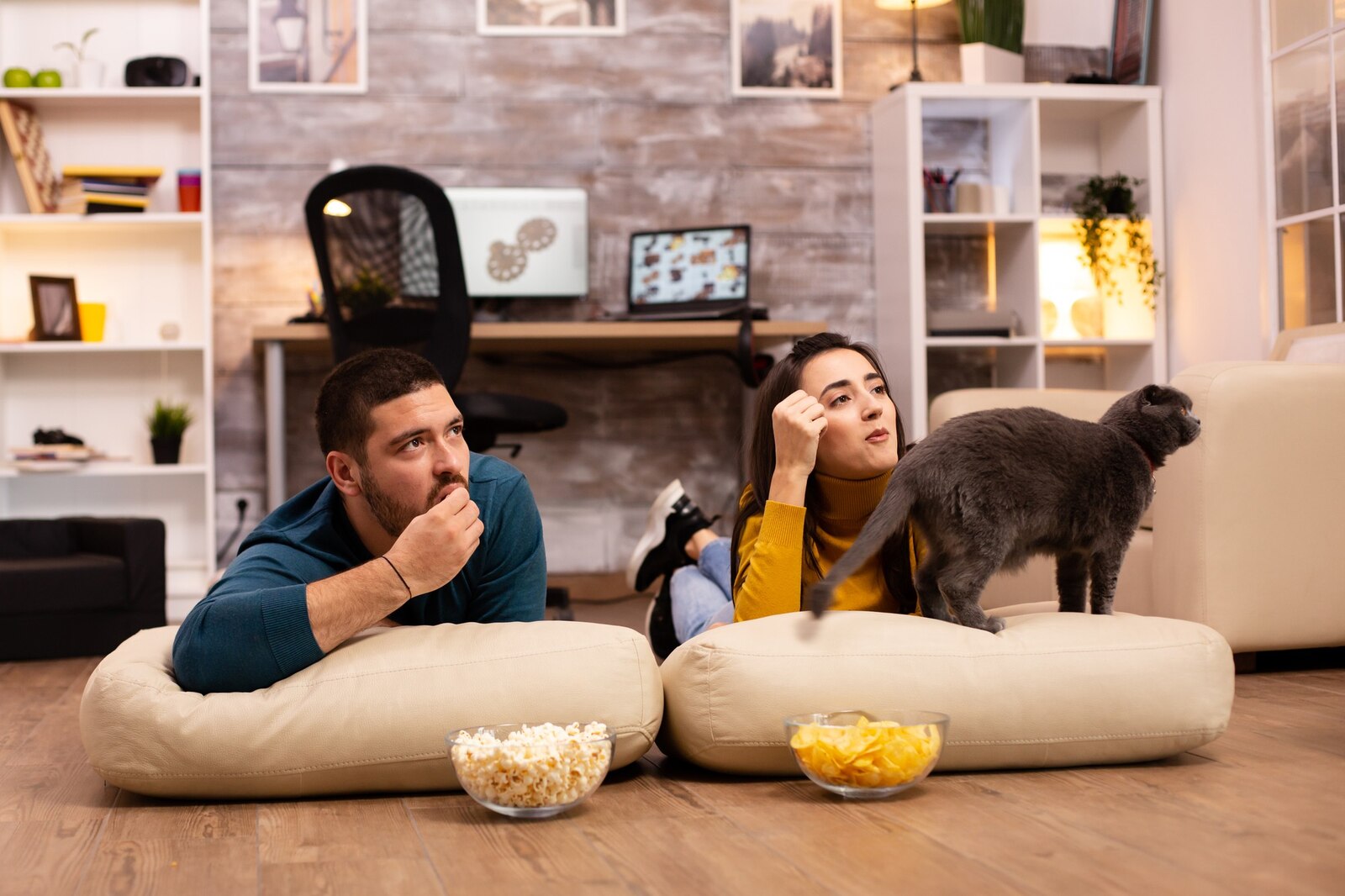 A person streaming IPTV content on a smart TV in a cozy living room.